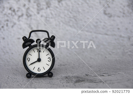Alarm clock pointing at 8 o'clock with customizable space for ideas or text. Copy space. 92021770
