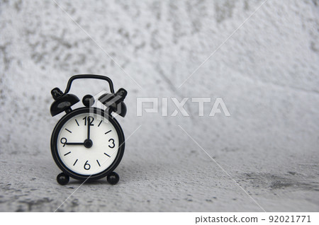 Alarm clock pointing at 9 o'clock with customizable space for ideas or text. Copy space. 92021771