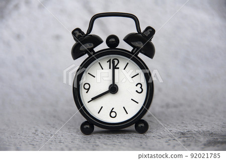 Alarm clock pointing at 8 o'clock with customizable space for ideas or text. Copy space 92021785