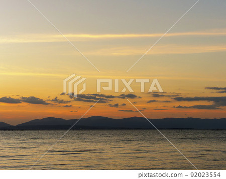 Dusk sky and lake landscape Dusk sky and lake landscape 92023554
