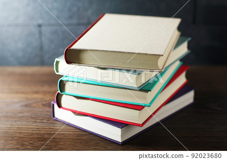 Books piled up on the table Books piled up on the table 92023680