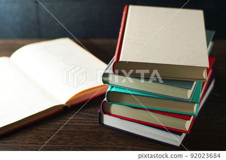 Books piled up on the table Books piled up on the table 92023684