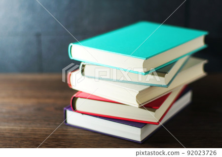 Books piled up on the table Books piled up on the table 92023726
