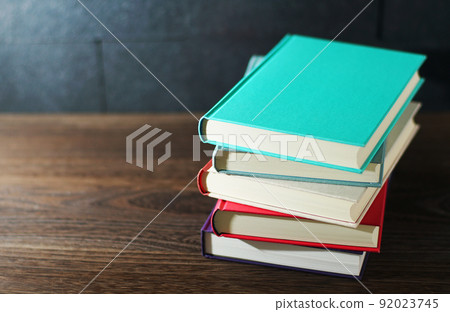 Books piled up on the table Books piled up on the table 92023745