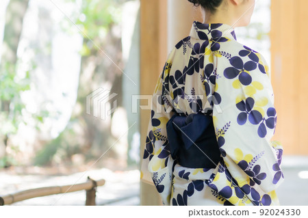 A woman enjoying sightseeing in a yukata 92024330