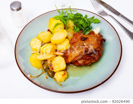 Portion of duck confit on table 92026490