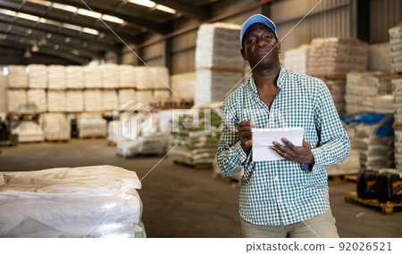 Portrait of man construction material storage worker 92026521