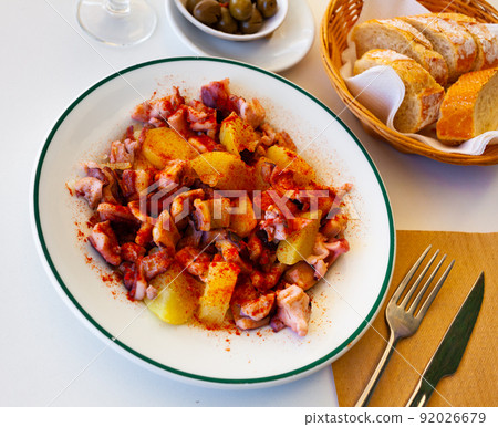 Galician-style octopus served on plate Galician-style octopus served on plate 92026679