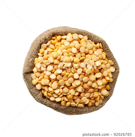 Raw dried peas in sack isolated on white background top view. Raw dried peas in sack isolated on white background top view. 92026785