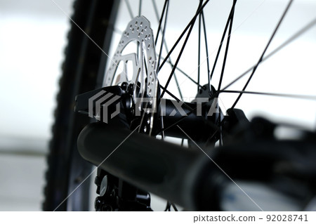 Bicycle wheel with spokes close-up. Bicycle repair 92028741