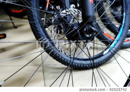 Bicycle wheel with spokes close-up. Bicycle repair Bicycle wheel with spokes close-up. Bicycle repair 92028742