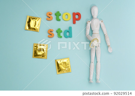 STOP STD, flat lay. World AIDS Day. Super safe strawberry condoms. Flat lay. STOP STD, flat lay. World AIDS Day. Super safe strawberry condoms. Flat lay. 92029514