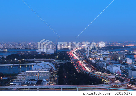 Ferris wheel and night view of the highway Ferris wheel and night view of the highway 92030175