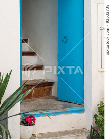 Typical wooden door and stairs to a house in the old historic center of Ibiza, Balearic Islands, Spain. 92032738
