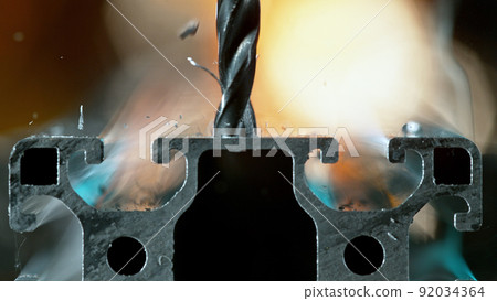 Drilling aluminium tube, close-up. 92034364