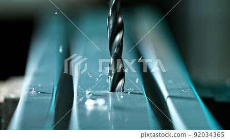 Drilling aluminium tube, close-up. 92034365
