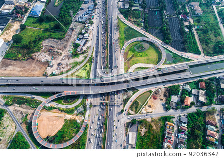Traffic road junction view from above with green tree 92036342