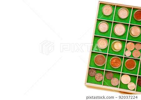 Isolated coin album with copy space as a hobby concept. Collecting coins, numismatism Isolated coin album with copy space as a hobby concept. Collecting coins, numismatism 92037224