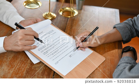 Top view, A professional male lawyer is counselling his client in the office 92038818