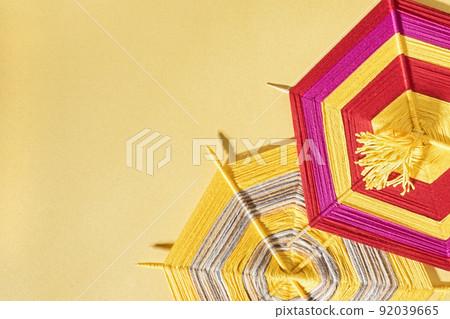 Background for Hispanic Heritage Month with Mandala God Eye Mexican or  Peruvian or Latin American crafts 92039665