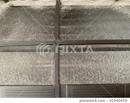 Air conditioner filter dirty with dust photo material 92040459