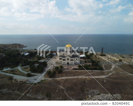 Chersones Sevastopol Crimea. Ruines of the ancient Greek city of Chersones. Archaeological excavations of an ancient structure. Aerial drone view Vladimir Cathedral and Chersonese Taurian, Crimea 92040491