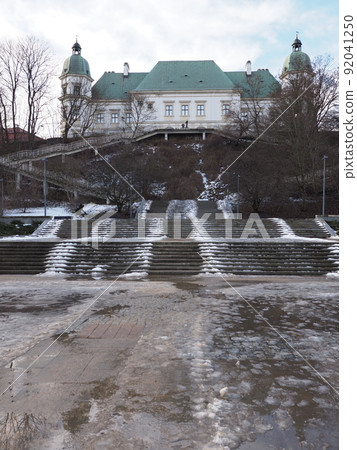 Stairs and Ujazdow castle in baths park in Warsaw, Poland - vertical Stairs and Ujazdow castle in baths park in Warsaw, Poland - vertical 92041250