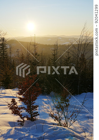Sun set over Silesian Beskid near Bialy Krzyz in Poland - vertical Sun set over Silesian Beskid near Bialy Krzyz in Poland - vertical 92041299