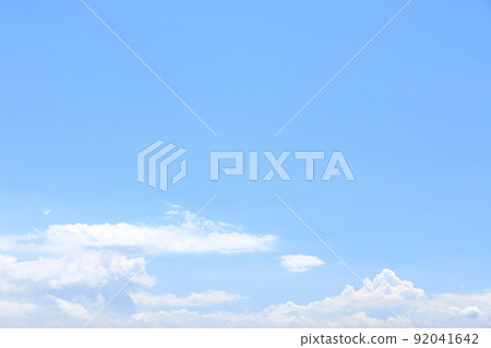 White clouds in a refreshing blue sky White clouds in a refreshing blue sky 92041642