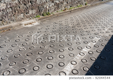 O-ring on concrete pavement O-ring on concrete pavement 92044544
