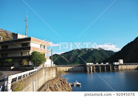 Anou Dam and management office in the autumn sky Anou Dam and management office in the autumn sky 92045078
