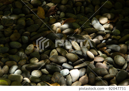 closeup of a pile of pebbles closeup of a pile of pebbles 92047731