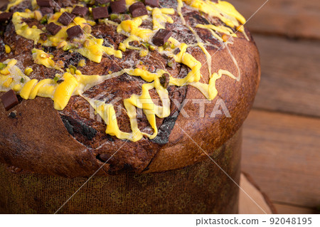 Tradidional Italian Christmas Cake Panettone on wooden background. close up 92048195