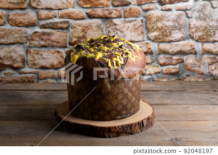 Tradidional Italian Christmas Cake Panettone on wooden background Tradidional Italian Christmas Cake Panettone on wooden background 92048197