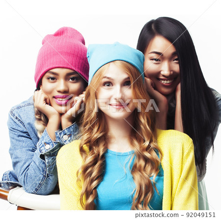 diverse nation girls group, teenage friends company cheerful having fun, happy smiling, cute posing isolated on white background, lifestyle people concept close up 92049151