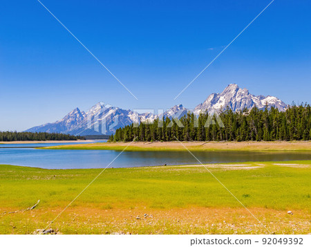 Sunny view of the Teton mountain range of Grand Teton National Park 92049392