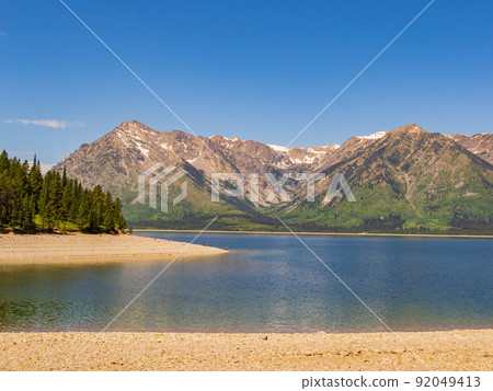 Sunny view of the Teton mountain range of Grand Teton National Park 92049413