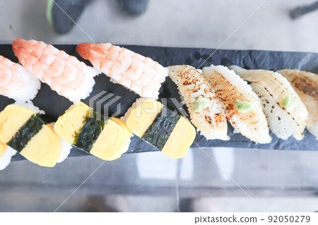 sushi or engawa sushi or fish sushi and egg sushi , rice topped with engawa and shrimp sushi or prawn sushi or steam egg rolls or fish roll sushi or engawa sushi or fish sushi and egg sushi , rice topped with engawa and shrimp sushi or prawn sushi or steam egg rolls or fish roll 92050279