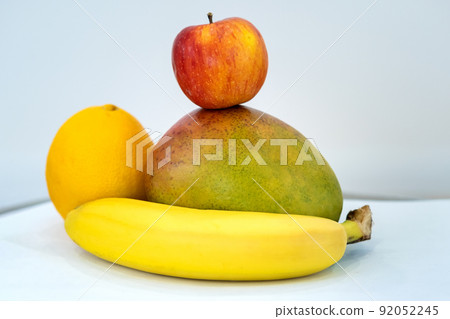 Close up of tropic fruits on a table. 92052245