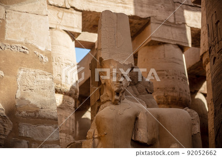 Statues of ancient Egyptian pharaohs and gods. Various hieroglyphs on the walls. Karnak temple is the largest complex in ancient Egypt. Statues of ancient Egyptian pharaohs and gods. Various hieroglyphs on the walls. Karnak temple is the largest complex in ancient Egypt. 92052662