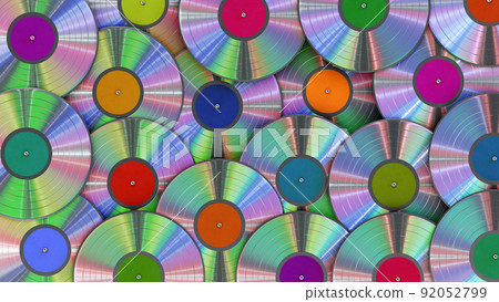 Realistic 3D illustration of the silver metallic iridescent vinyl records with colorful labels rendered as background 92052799