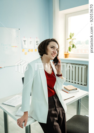 Young professionals, gen z working, first job. Confident young businesswoman working 92053670