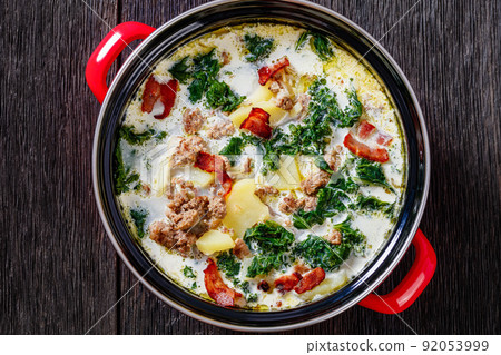 Zuppa Toscana,Tuscan Soup in red pot, top view 92053999