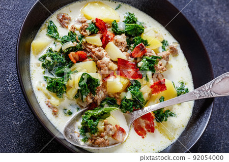 Zuppa Toscana,Tuscan Soup in black bowl, top view 92054000