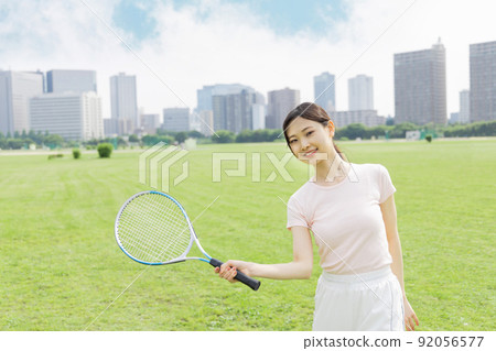Young woman tennis image 92056577