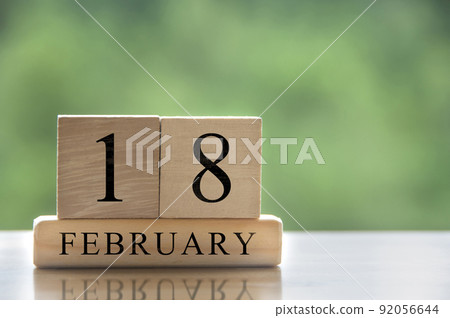 February 18 calendar date text on wooden blocks with customizable space for text or ideas. Copy space February 18 calendar date text on wooden blocks with customizable space for text or ideas. Copy space 92056644