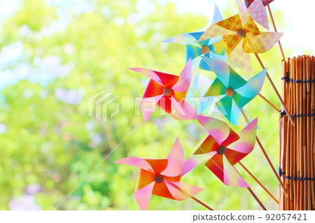 A pinwheel decorated on a bamboo blind 92057421