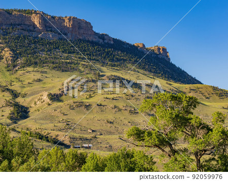 Sunny view of beautiful rural house on mountain 92059976