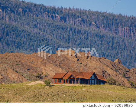 Sunny view of beautiful rural house on mountain 92059980