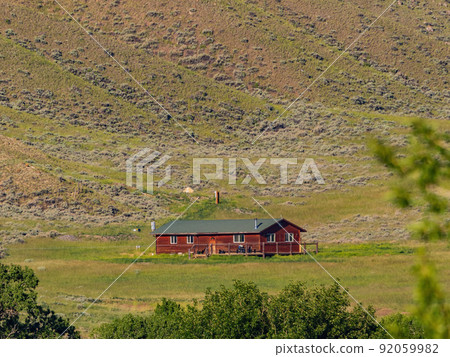 Sunny view of beautiful rural house on mountain 92059982